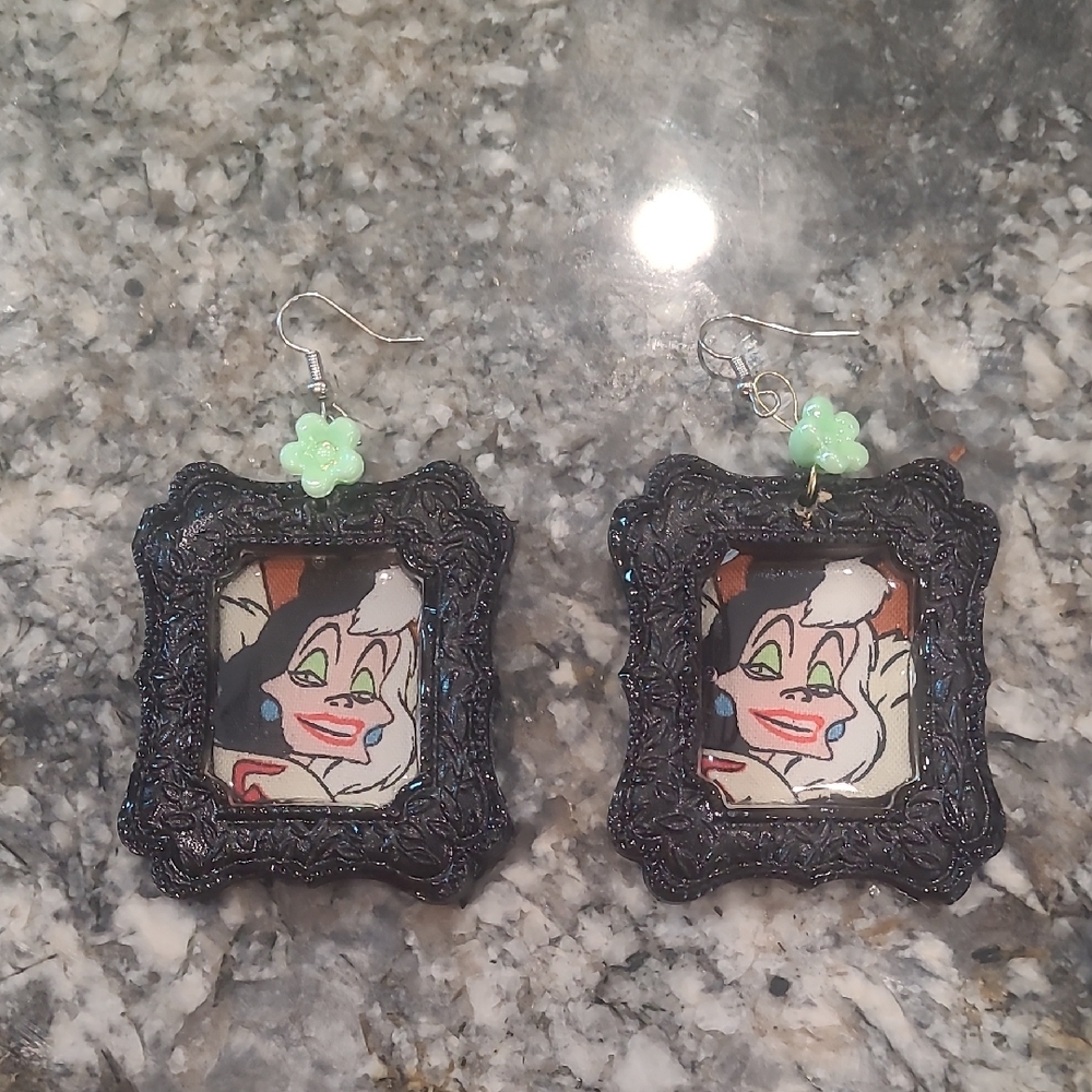 Black Framed Cartoon Earrings with Green Accents